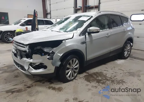2017 Ford Escape Titanium z USA, uszkodzony, nr VIN 1FMCU9J99HUB30801